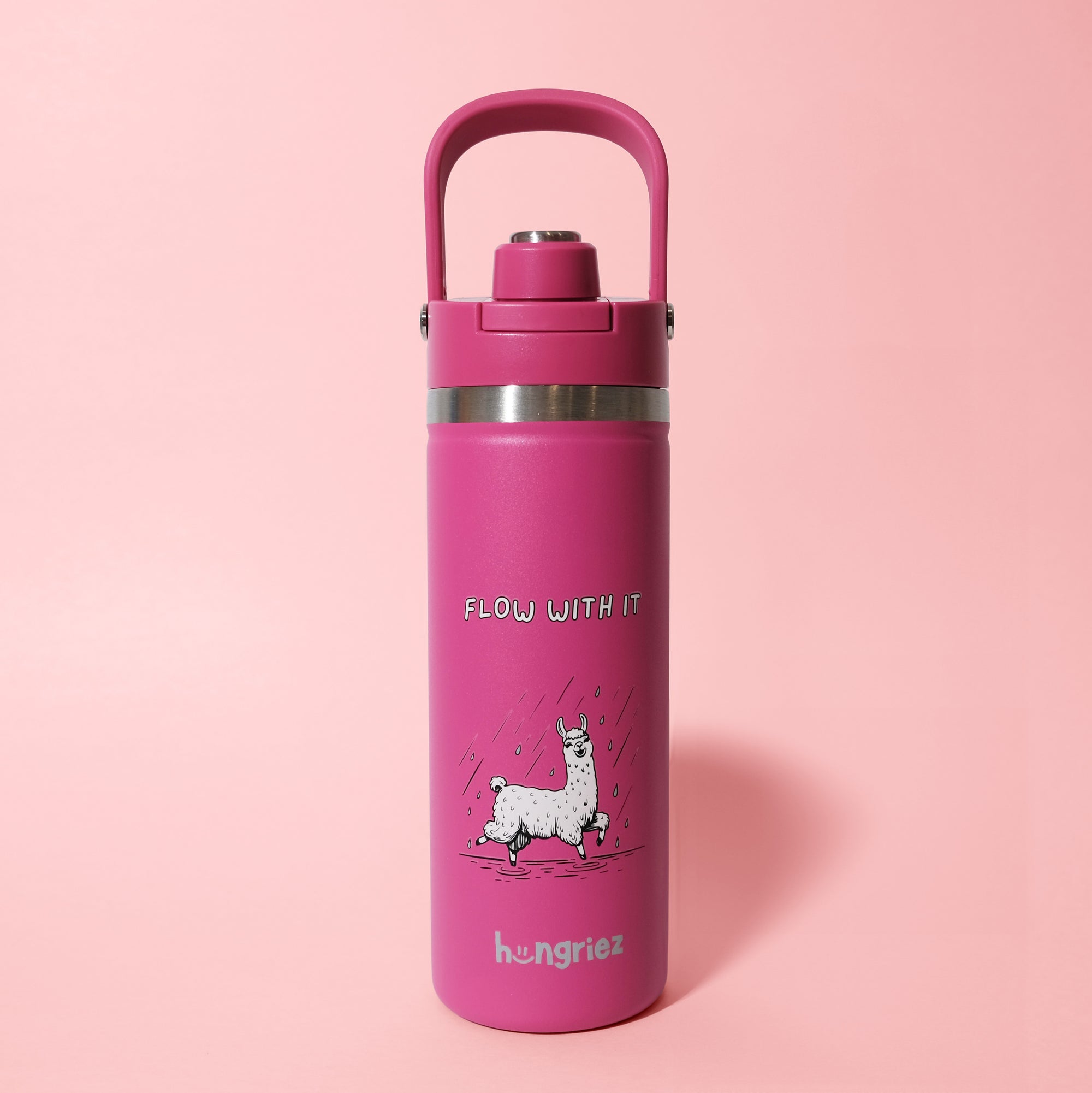 Pink water bottle with a llama design and 'flow with it' text on a pink background